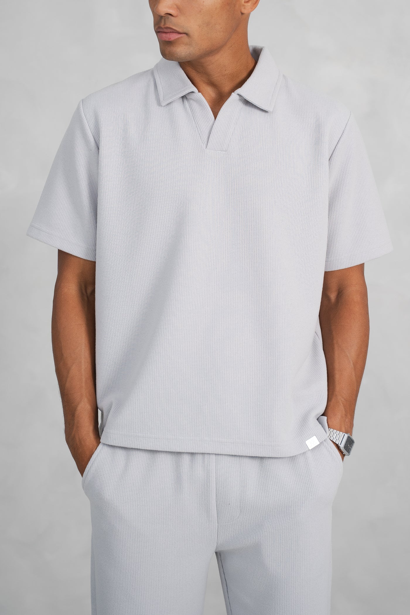 POLO OPEN NECK - GRIS